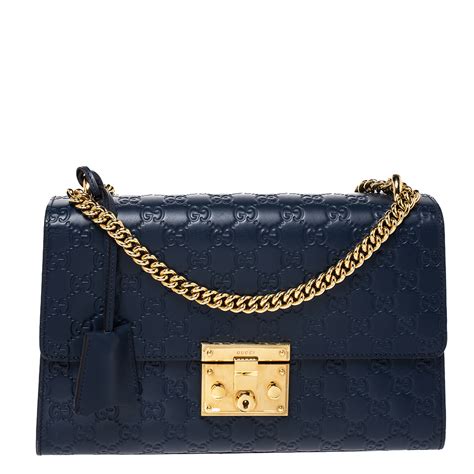 blue gucci logo|Gucci navy blue bag.